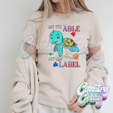 SEE THE ABLE NOT THE LABEL - NATURAL T-SHIRT-Country Gone Crazy-Country Gone Crazy